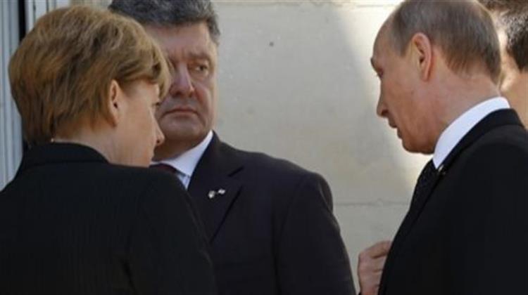 Πούτιν, Μέρκελ, Ολάντ, και Ποροσένκο Επανέλαβαν τη Δέσμευσή τους για Ειρήνη στην Ουκρανία